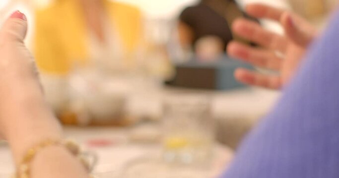 Close-up of hands gesticulation during conversation adds depth and expression to communication. Using hand movements, gestures, motions to emphasize points or convey emotions. No face people talking.