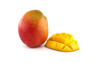 Ripe mango fruit and cubed cut half mango isolated on white