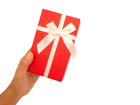Hand holding of a red gift box against a transparent background.