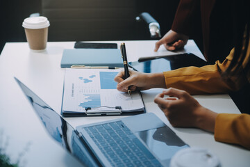 Financial Business team present. Business man hands hold documents with financial statistic stock...