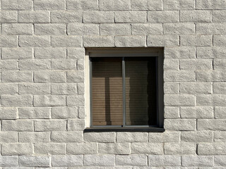 Warehouse Stone Wall with a Closed Window