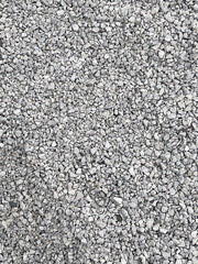 Close-up view of light gray gravel stones