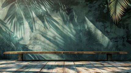 A serene scene with a solitary wooden bench under the tranquil shadows of palm leaves, casting patterns on a rustic wall. - obrazy, fototapety, plakaty