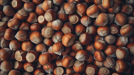 Fotobehang Background of fresh in-shell hazelnuts © Aleksandr Bryliaev