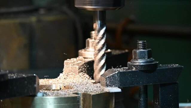 The hole boring  process on NC milling machine by flat end mill tool.