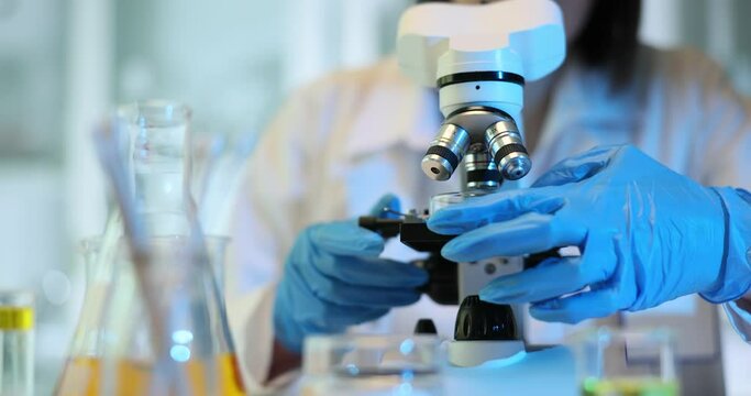 Microscopic analysis of a chemical substance in a petri dish in a laboratory