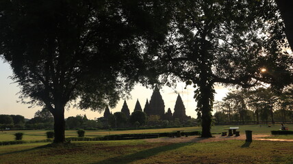 View of the temple in the ancient Prambanan temple complex with the evening sky in the background. Popular tourist destination.