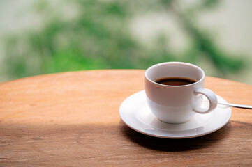 cup of coffee on wooden table - 793559775