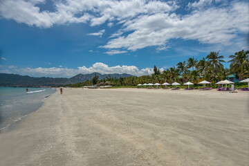 The sandy beach of the DocLet Beach Resort on the shores of the South China Sea. Vietnam