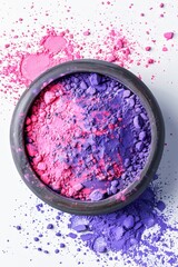 Crushed Pink and Purple Holi Powder in a White Bowl on a Pastel Background