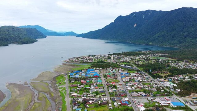 Aerial View Hualaihué, A Chilean commune located in Palena Province, Los Lagos Region Beside Fjord Waterway. Dolly Left Shot