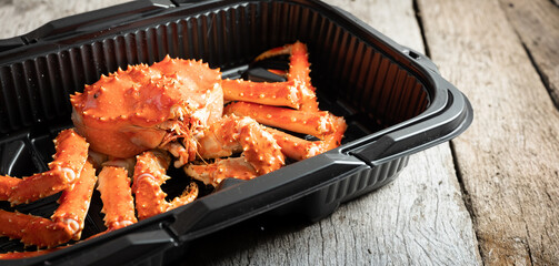 King crab steamed in a delivery container
