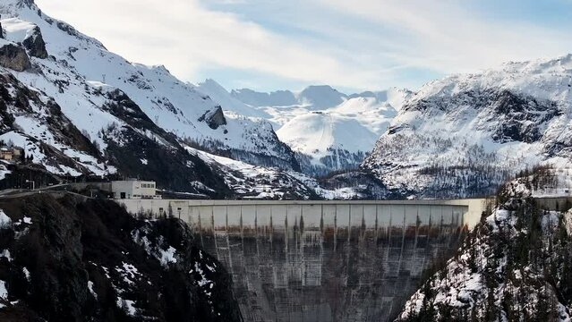 Aerial Raising Over Dam Chevril Lake Tignes Savoie France Winter Snow Mountains Alpine Landscape Val d'Isere
