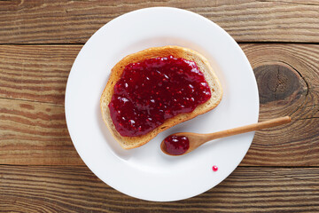 Toasted bread with jam on a plate
