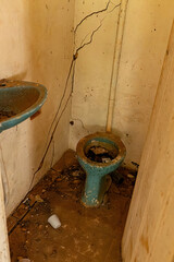 abandoned dirty small bathroom