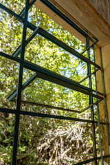 Old metal window from an abandoned building