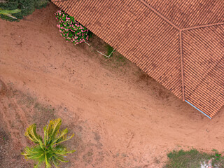 top viewof farm with roof plants and dirt floor