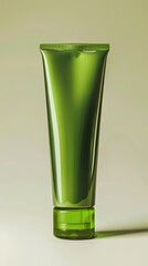 Green skincare lotion tube on a creamy background.