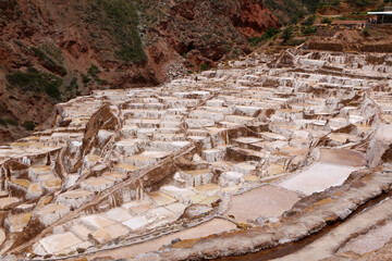 Salt evaporation ponds in Maras salt mines in Cusco city the Sacred Valley, Peru