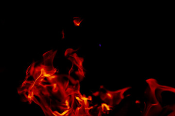 Fototapeta premium Background of the flame in the oven. Overlay layer. Tongues of fire in a fireplace.