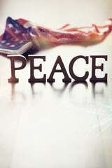 Double exposure Peace Word Written In Wooden Letters and abstract technology background....