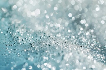 Glistening ocean-like sparkles shimmering on a transparent white background, evoking images of underwater worlds