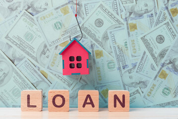 Conceptual Trap of Home Loan Depicted with House on Fish Hook