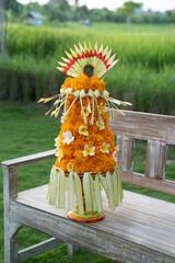 Gebogan is a Hindu offering in Bali which consists of an arrangement of fruit, snacks and flowers arranged neatly on a tray.