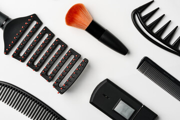 Pattern of various shaving and bauty care accessories for men on gray background