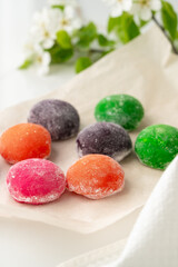 Multi-colored Japanese cakes Mochi in a white plate