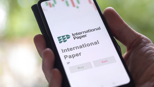 April 09th 2024 , Memphis, Tennessee. Close up on logo of International Paper on the screen of an exchange. International Paper price stocks, $IP on a device.