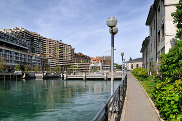 Geneva, Switzerland, Europe - Rhone river, footpath leading to hydroelectric power station and BFM...