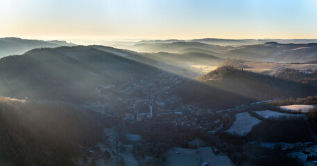 Foggy frosty morning aerial panoramic shot of village Doubravník in czech republic