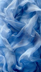 Tranquil blue silk waves, soft flowing fabric, calming abstract background with text space