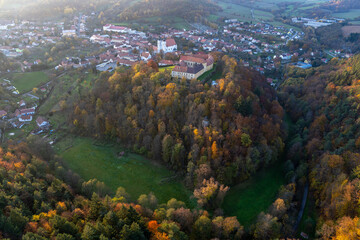 Aerial shot of the centre of Lomnice city, Czech republic, in amazing autumn atmosphere with its historic centre.