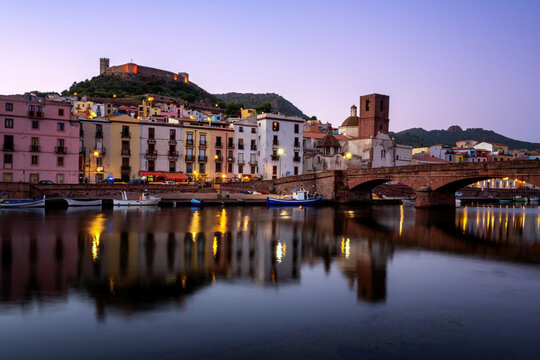 Bosa city colorful buildings, historic bridge and castle in Sardinia