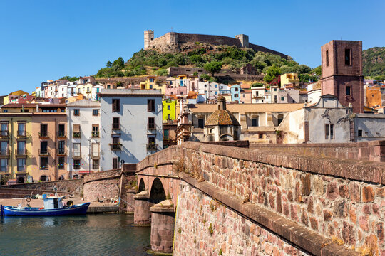 Bosa city colorful buildings, historic bridge and castle in Sardinia