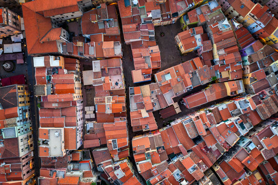 Bosa historic colorful city buildings drone above view in Sardinia