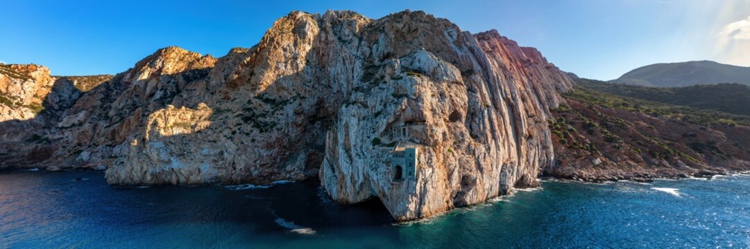 Porto Flavia mine on the rock aerial drone panorama view in Sardinia