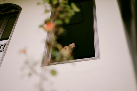 Young woman taking a shower
