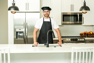 Cooking and culinary concept. Chef cook in uniform on kitchen. Male chef or cook baker man in apron...