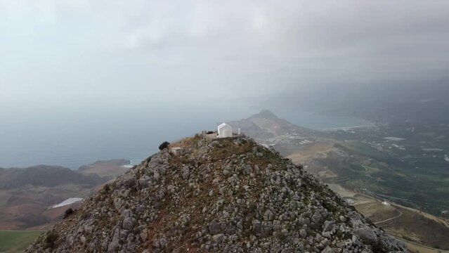 Panorama Mountain Top View: Epic 360 Degree Viewpoint - Greek Island of Crete. Ekklisia Timios Stavros: Plakias, Greece on the South Coast of Kriti. 4K Aerial Drone Shot of Valleys and Sea.