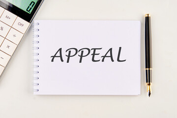 Word APPEAL on a white notebook - obrazy, fototapety, plakaty