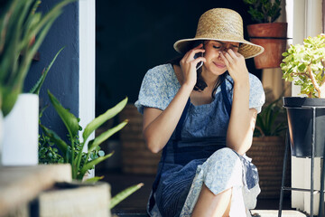 Woman, phone call and garden with crying from sad news, conversation and discussion at home....
