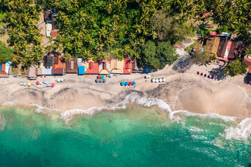 Bali, Indonesia: Aerial overhead view the whie sand Virgin beach and Candidasa in eastern Bali in...