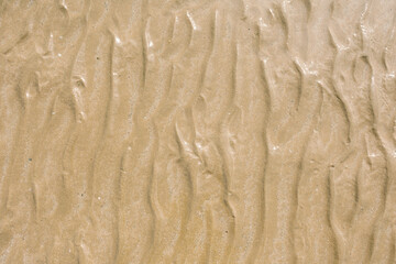 waves pattern at the sand