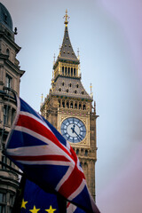 big ben clock tower with UK flag
