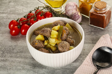 Soup with meatball and potato