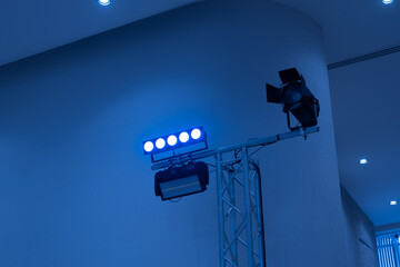 LED lights hanging on a truss at event professional lighting device colored equipment