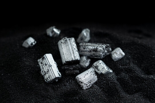 Pure silver or platinum or rare earth from the mine that was placed on the black sand